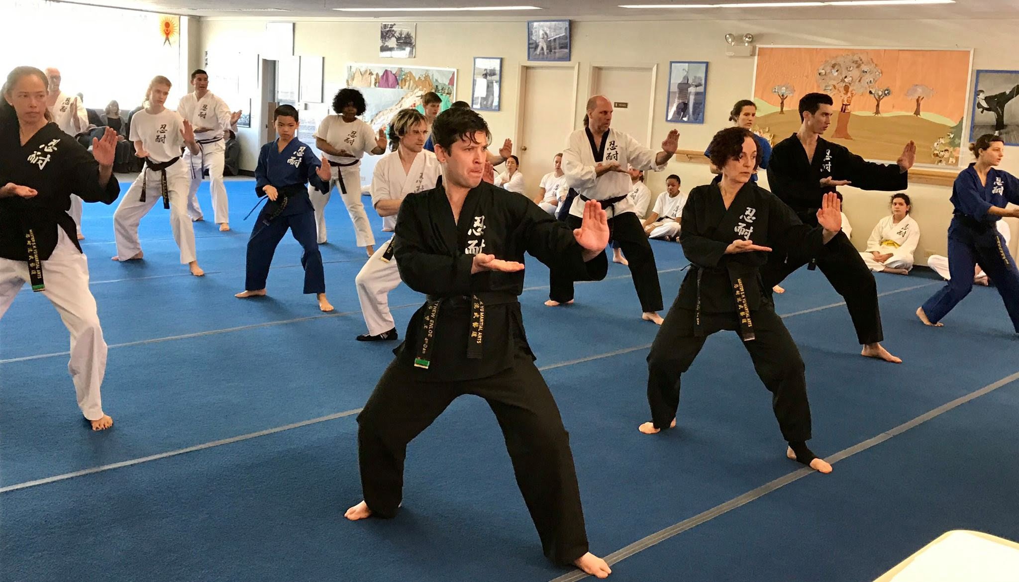 Martial arts college coaching self-confidence even as graduating black belts 1